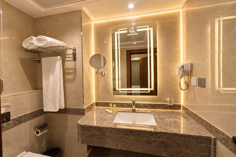 luxurious warm lit hotel bathroom 2